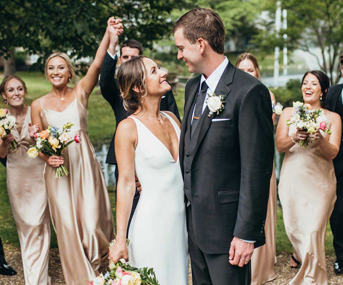 Outdoor Wedding Venue with Happy Couple